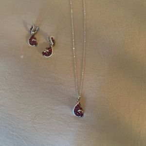 925 SS necklace and pierced earrings with diamonds and rubies. 18in chain.
